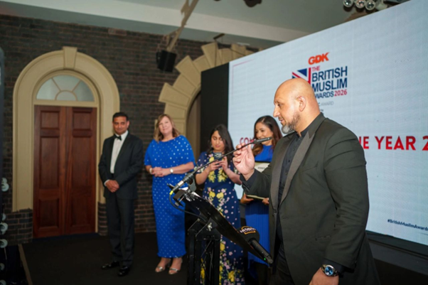 Amjad speaks at the ceremony