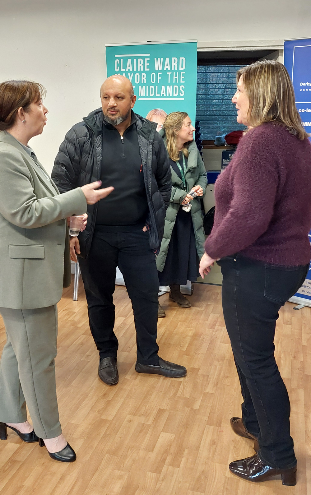 Amjad and Helen Britten from Community Action chatting with Mayor Claire Ward