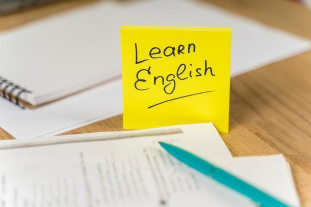 Photo of a post-it note with Learn English written on it