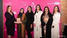 Empower Her, winner of the Youth Work Award, receiving their award from Community Action's Michelle Butler, who coordinates the Derby Youth Alliance.