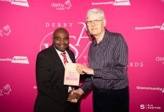 Nigel Farrow, winner of the Trustee of the Year Award, receiving his award from Ray Khumalo, Chair of Community Action Derby.