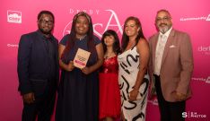 Anansi Theatre Company, winner of the Arts, Culture and Heritage Award, with award presenter Akindayo Akindolani from TES Community CIC, an organisation supporting communities through culture, creativity and education, and a Trustee at Community Action Derby and award host Amo Raju OBE DL