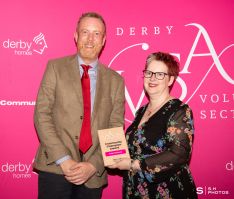 Anita Marbrow, winner of the Community Champion Award, receiving her award from Jonathan Dwerryhouse, Strategy and Partnership Manager at Community Action.