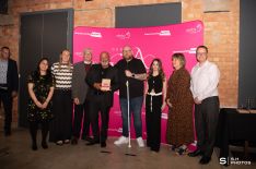 Derby Trailblazers Basketball Club, winner of the Sporting Award, receiving their award from Community Action's Aliyah Khan, who works on the DE23 Active programme.