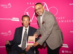 Rob Malcolm, winner of the Equality, Diversity and Inclusion Award, receiving his award from Dr Amo Raju, The Disability Ambassador and one of Community Action Derby's trustees.