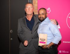 Terrance Amalathas, winner of the New Arrivals Ambassador Award, receiving his award from Richard Keene, Community Action’s New Arrivals Alliance Manager.